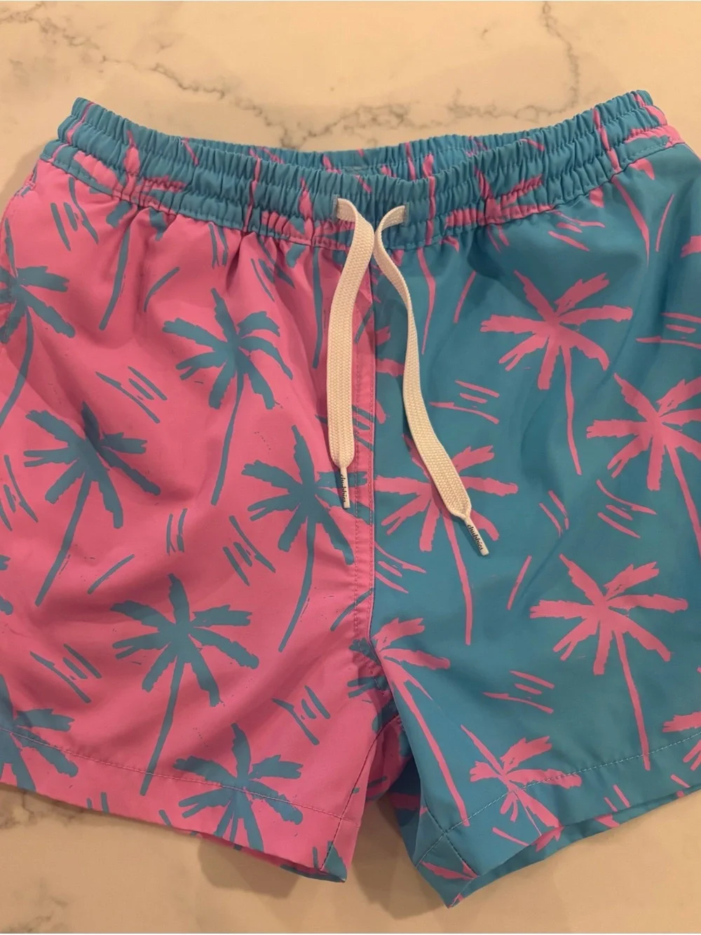 Chubbies. Boy 10-12yrs. Palm Tree Swim Shorts in Pink & Teal